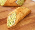 Italian cannolo with ricotta cream and pistachios Royalty Free Stock Photo