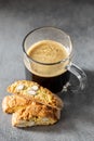 Italian cantuccini cookies and coffee cup. Sweet dried biscuits with almonds Royalty Free Stock Photo