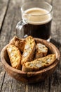 Italian cantuccini cookies and coffee cup. Sweet dried biscuits with almonds Royalty Free Stock Photo