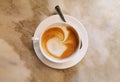 Italian cappuccino espresso macchiato coffee on the marble counter of a bar