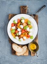 Italian Caprese salad with cherry tomatoes, small mozzarella and fresh basil Royalty Free Stock Photo