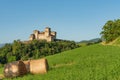 Italian castle and hay bales Royalty Free Stock Photo