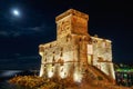 The italian castle on sea by night, Rapallo, Italy Royalty Free Stock Photo