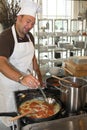 Italian chef cooking pasta Royalty Free Stock Photo