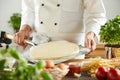 Italian chef making traditional pizza Royalty Free Stock Photo