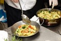 Italian chef prepares pasta