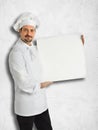 Italian chef showing the menu