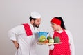 Italian Chief cook and Handsome Cooky with Tray of Vegetables