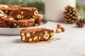 Italian Christmas dessert panforte with nuts, chocolate and candied fruits. Christmas background Royalty Free Stock Photo