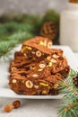 Italian Christmas dessert panforte with nuts, chocolate and candied fruits. Christmas background Royalty Free Stock Photo