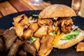 Italian ciabata bread served with fresh salade and vegan fried chicken in pieces Royalty Free Stock Photo