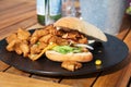 Italian ciabata bread served with fresh salade and vegan fried chicken in pieces Royalty Free Stock Photo