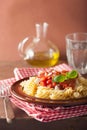 Italian classic pasta fusilli with tomato sauce and basil Royalty Free Stock Photo