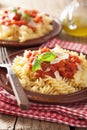 Italian classic pasta fusilli with tomato sauce and basil Royalty Free Stock Photo
