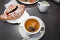 Italian coffee with jam croissant on the table Royalty Free Stock Photo