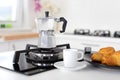 Italian coffee maker and croissants Royalty Free Stock Photo