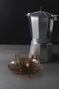 Italian coffee maker and empty brown glass pot on black background Royalty Free Stock Photo