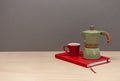 Italian coffee maker small cup and red notebook Royalty Free Stock Photo