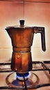 Italian coffee maker on stove. Espresso coffee.