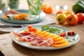 italian cold cuts with melon slices on sidedish Royalty Free Stock Photo