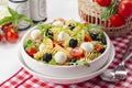 Italian cold pasta salad or Pasta fredda alla caprese. Fusilli, tomato, mozzarella Royalty Free Stock Photo