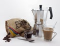 Italian cooffe maker, colombian coffee and cup of latte coffee