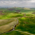 Italian countryside scenery featuring a hilltop residence in Tuscany.