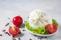 Italian Cream Burrata Cheese on light background.