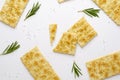 Italian crunchy rosemary crackers on white