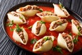 Italian cuisine: conchiglioni pasta stuffed with ground beef wit