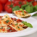 Italian cuisine eating Pasta Ravioli with tomato sauce noodles m Royalty Free Stock Photo