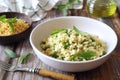 Italian Cuisine. Mock risotto. Stortini pasta with green peas Royalty Free Stock Photo