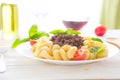 Italian cuisine penne bolognese or Bolognaise sauce noodles pasta meal on a plate on white wooden table Royalty Free Stock Photo