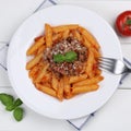 Italian cuisine penne Rigate Bolognese sauce noodles pasta meal Royalty Free Stock Photo