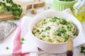 Italian cuisine. Plate of green pea risotto with green pea, parmesan cheese, olive oil and parsley Royalty Free Stock Photo