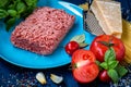 Products for the preparation of Pasta Bolognese. Minced meat, tomatoes, spaghetti, Basil, Parmesan cheese, spices Royalty Free Stock Photo