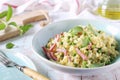 Italian Cuisine. Stortini pasta with green peas and bacon Royalty Free Stock Photo