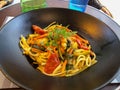 Vegetables and pasta on black plate Royalty Free Stock Photo