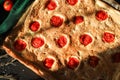 Italian delicious focaccia rectangle bread with sliced cherry tomatoes