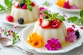 Italian dessert. Strawberry Panna Cotta with sauce, on a plate. Light grey background. Delicious dessert. Panna cotta decorated