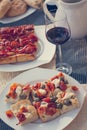 Italian Dinner: Red wine, fresh tasty pizza in the evening, vacation Royalty Free Stock Photo