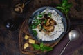 Italian dish risotto with mushrooms and herbs