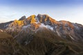 Italian Dolomites - view of the snow-capped peaks of the Dolomites, which are illuminated by the setting sun with a beautiful blue
