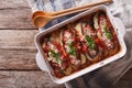 Italian eggplant baked with mozzarella in tomato sauce in baking