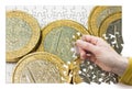 Italian euro coins group on white background - concept image in jigsaw puzzle shape Royalty Free Stock Photo