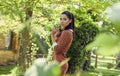 Italian fashion woman in sunny garden . Royalty Free Stock Photo