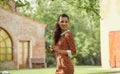 Italian fashion woman in sunny garden .