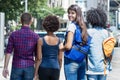 Italian female exchange student with group of international young adults Royalty Free Stock Photo