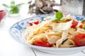 Italian fettuccine pasta with cherry tomatoes and parmesan Royalty Free Stock Photo