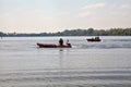 Italian firefighters boats on a lake during a training Royalty Free Stock Photo